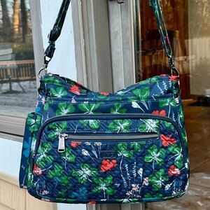 Lug Shimmy cross body bag, like new, blue, green, red floral pattern